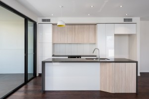 kitchen with gooseneck spout and timber 